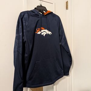 Size M, NFL Denver Broncos Hoodie With Orange And Blue Camo Accents